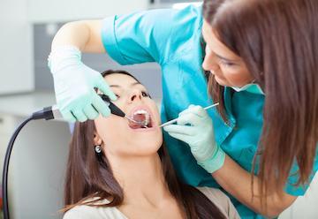 woman at dentist in murphy tx